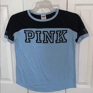 VS PINK t-shirt with net on the sleeves.
